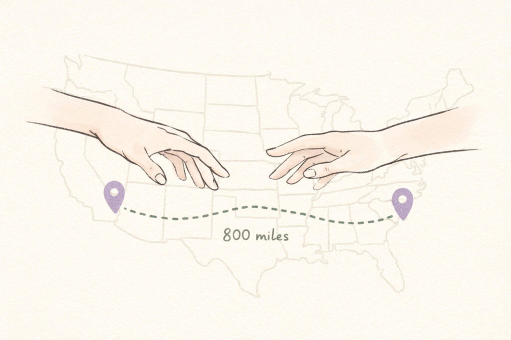 Two hands reaching across distance symbolizing lifelong friendship maintained over 800 miles